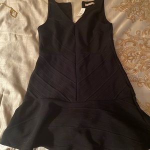 Black dress with flounce hem